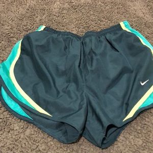 Blue and yellow Nike shorts